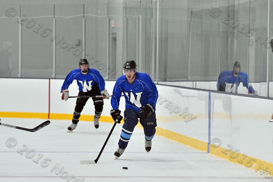 Wheaton College Men\'s Ice Hockey vs Middlesex Community College. - Photo By: KEITH NORDSTROM